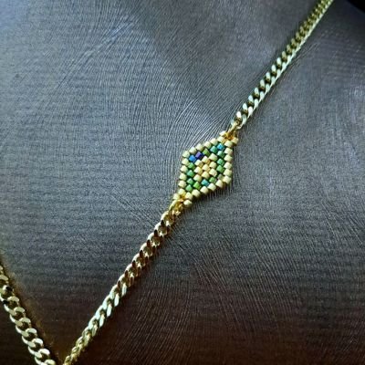 طقم بتصميم ورق الشجر باللون الاخضر من خرز الميوكى