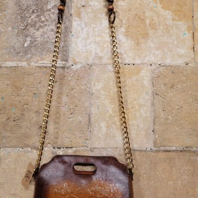 Tooled leather clutch 