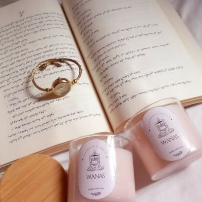 &ldquo;Clear white jar with a light wood lid&rdquo;