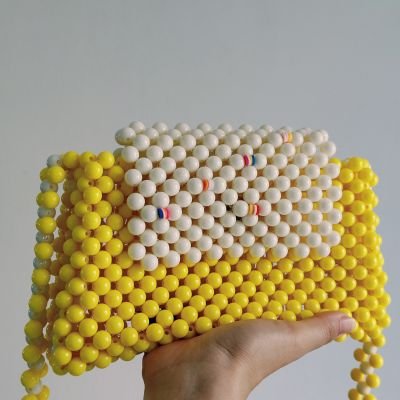 Beaded bags in yellow color