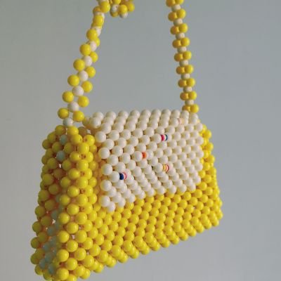 Beaded bags in yellow color