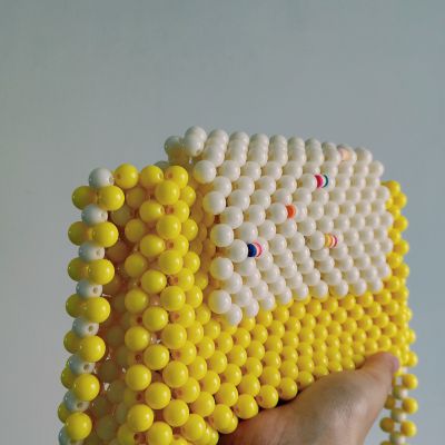 Beaded bags in yellow color