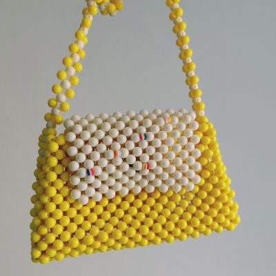 Beaded bags in yellow color