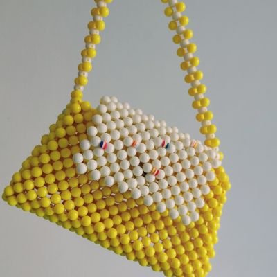 Beaded bags in yellow color