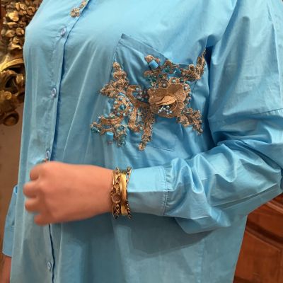 قميص تركواز 