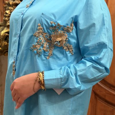 قميص تركواز 