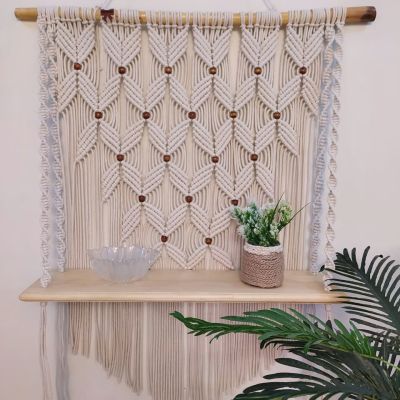 Macrame wall hanging with shelf 