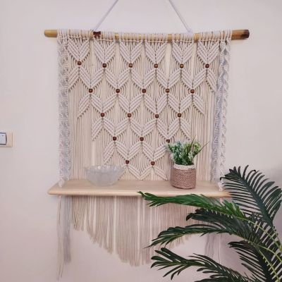 Macrame wall hanging with shelf 