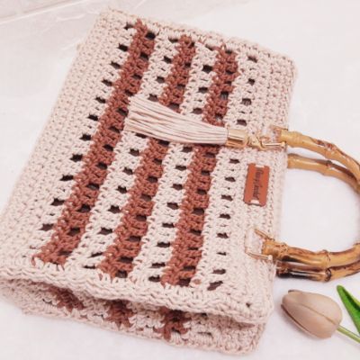 شنطة كروشية بيد عاج