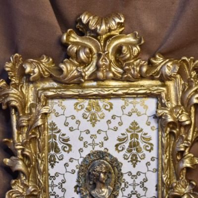 Antique gold plated tableau