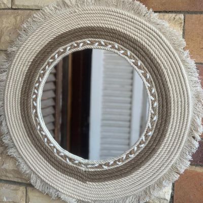Mirrors with macrame threads