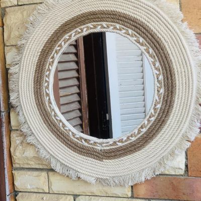 Mirrors with macrame threads