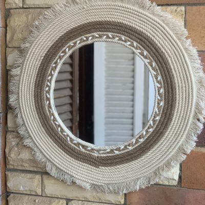 Mirrors with macrame threads