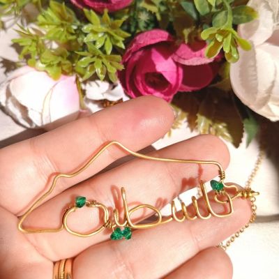 A copper chain in the shape of a map of Palestine