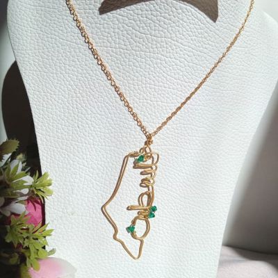A copper chain in the shape of a map of Palestine