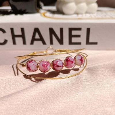 سوار من النحاس مع خرز المرمر