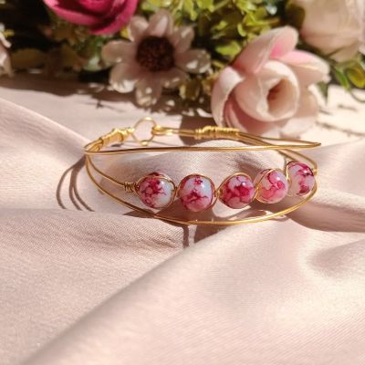 سوار من النحاس مع خرز المرمر