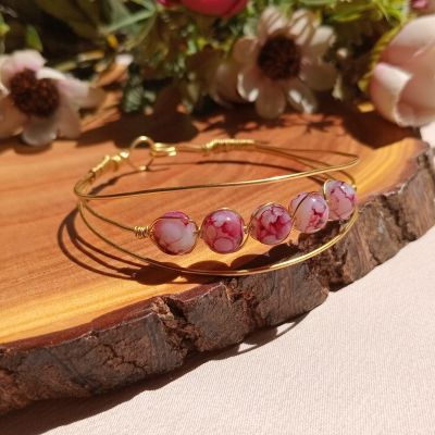 سوار من النحاس مع خرز المرمر