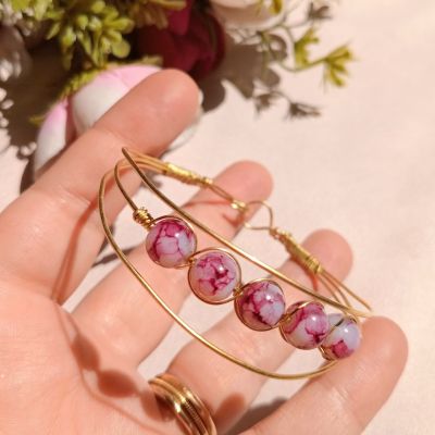 سوار من النحاس مع خرز المرمر