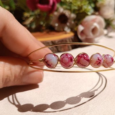 سوار من النحاس مع خرز المرمر