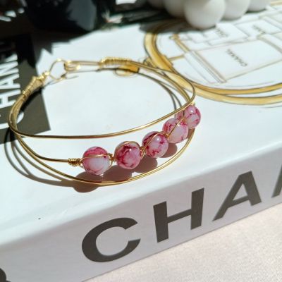 سوار من النحاس مع خرز المرمر