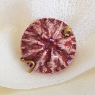 دبوس خزفي للملابس