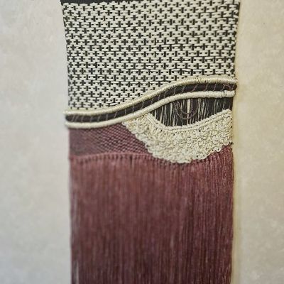 لوحة جدارية من النول 