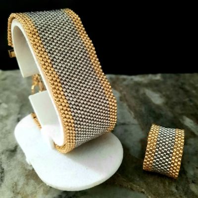 إسورة وخاتم من الفضى والذهبى من خرز الميوكى