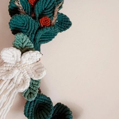 A hoop decorated with macrame 