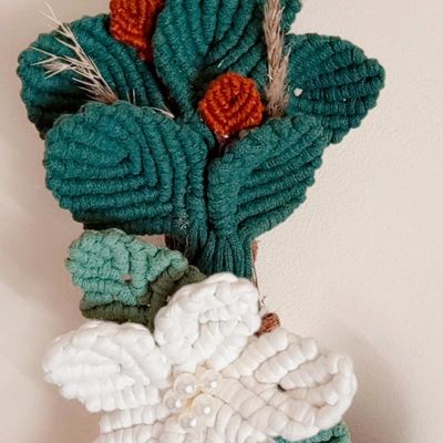 A hoop decorated with macrame 