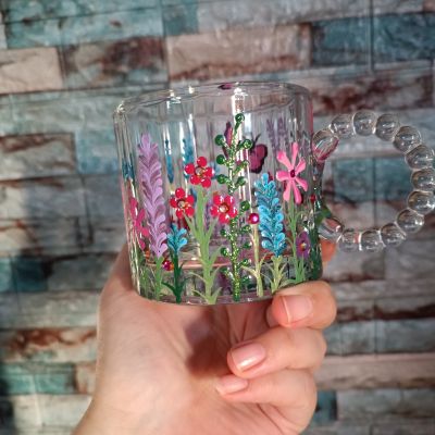 Glass mug with flowers 