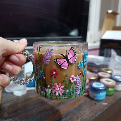 Glass mug with flowers 