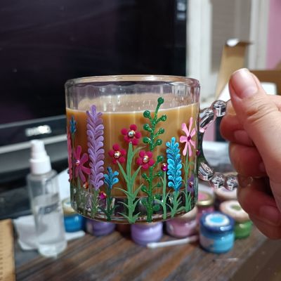Glass mug with flowers 
