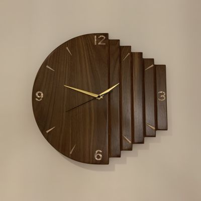ساعة حائط من خشب الجوز الافريقي