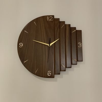 ساعة حائط من خشب الجوز الافريقي