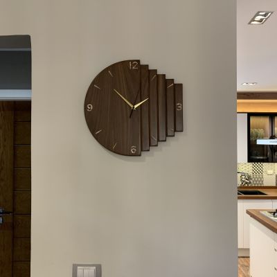 ساعة حائط من خشب الجوز الافريقي