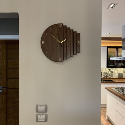 ساعة حائط من خشب الجوز الافريقي