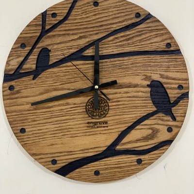 ساعة حائط من خشب الأرو الطبيعي المسيف
