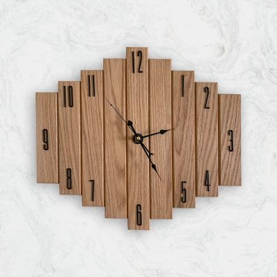 ساعه حائط من خشب الأرو