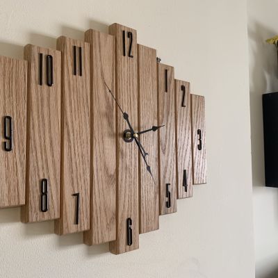 ساعه حائط من خشب الأرو
