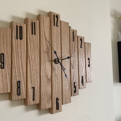 ساعه حائط من خشب الأرو