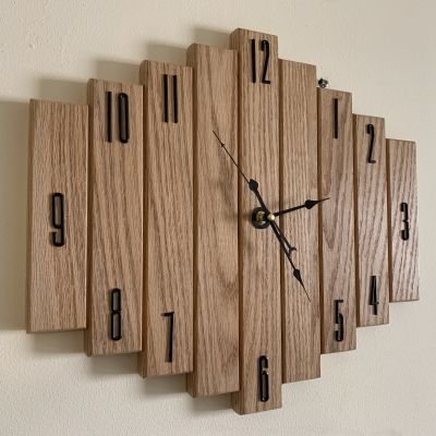 ساعه حائط من خشب الأرو