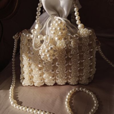 A bag of roses and acrylic roses