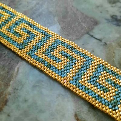 طقم بنمط الفيرزاتشى باللون الفيروزى من خرز الميوكى