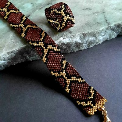 مجموعة تصميم جلد الثعبان باللون الأحمر الغامق من خرز الميوكى