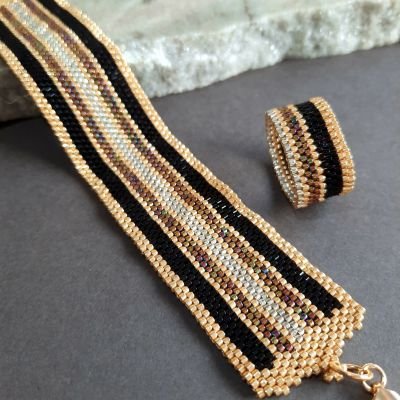 Design with shiny colorful lines with golden by Miyuki beads