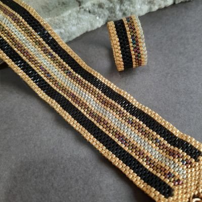 Design with shiny colorful lines with golden by Miyuki beads