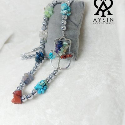 Necklace made of hematite stones and the seven chakras.