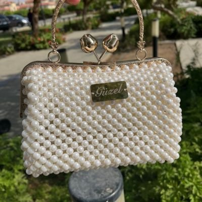 شنطة لولي اوف وايت فريم دهبي يد مدوره 