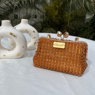 A bag of crystal with a gold frame